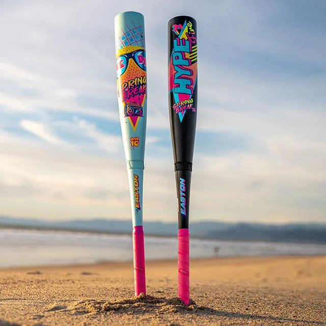 Two baseball bats on the coast.