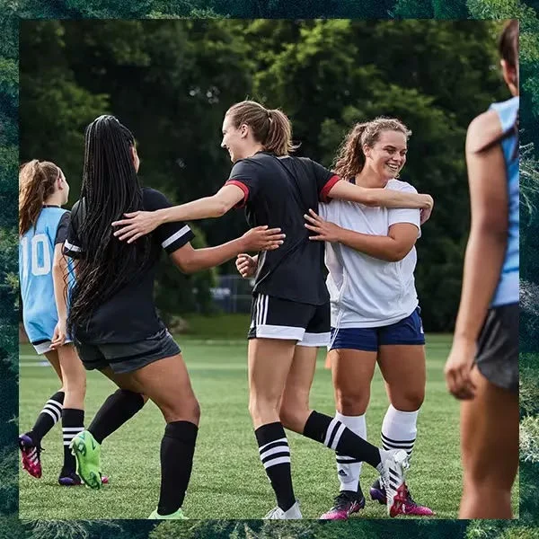 Athletes playing soccer