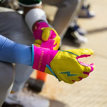 Player putting on batting glove.