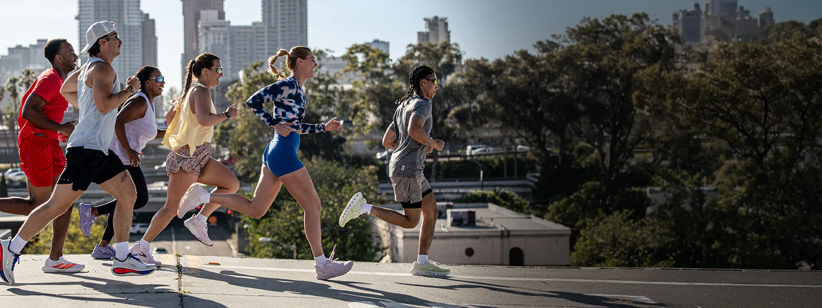 Athletes running outside and running footwear.