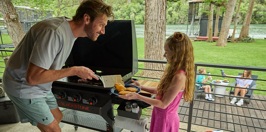 People grilling outdoors.