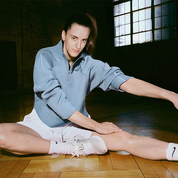 Caitlin Clark stretching. 