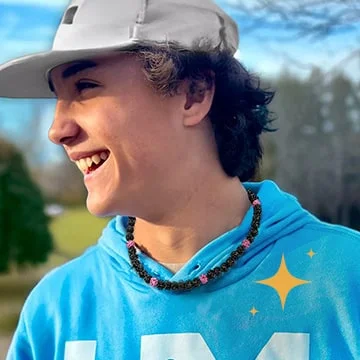 Youth with necklace.