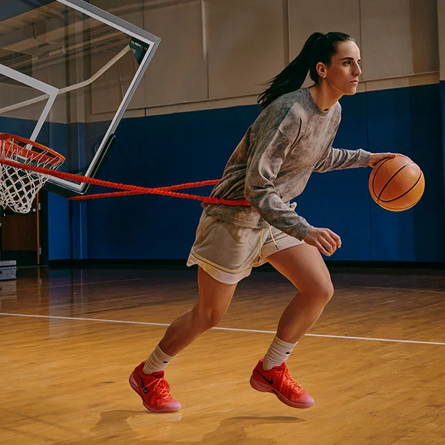 Caitlin Clark dribbling basketball