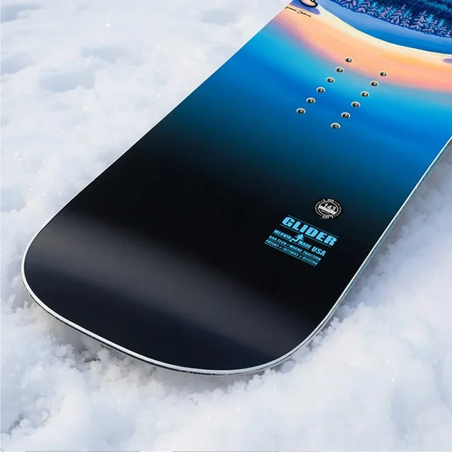 Snowboard on snow.