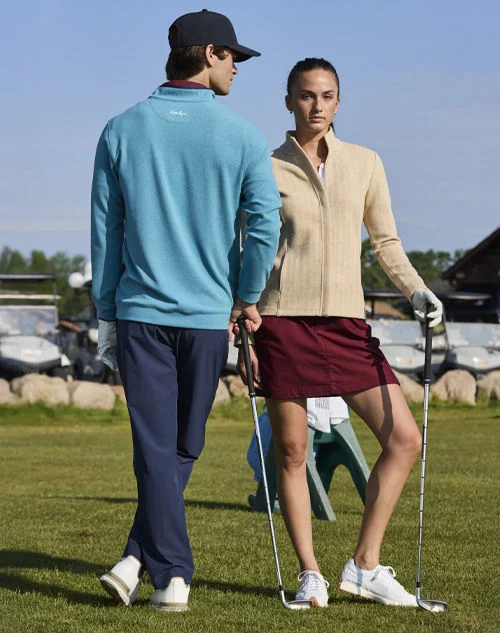 people standing on golf course