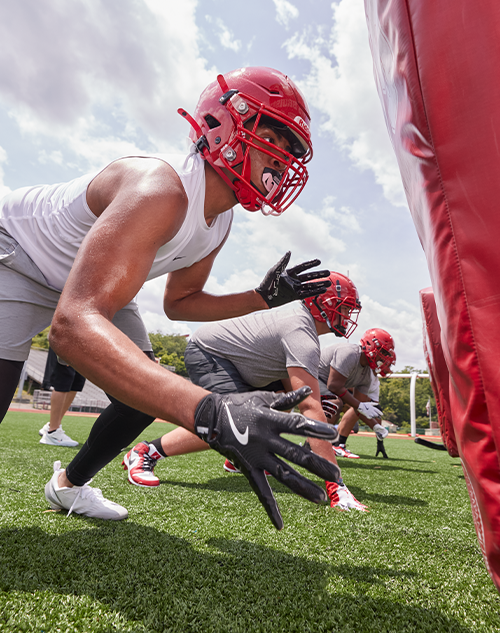 Athletes at football practice.