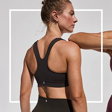 Back of a woman in a sports bra. 