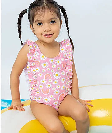 A toddler in swimwear.