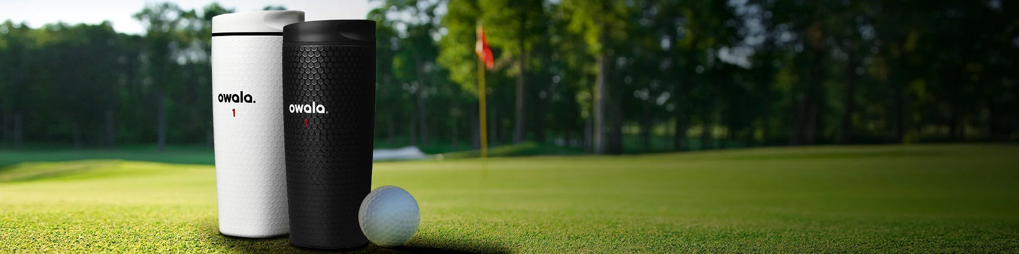 Owala water bottles on a putting green