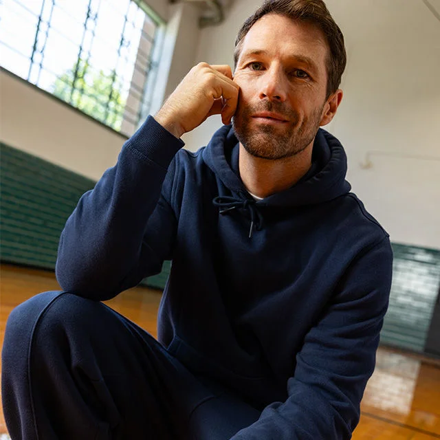Man in DSG hoodie. 