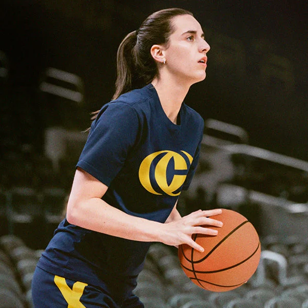 Caitlin Clark playing basketball. 