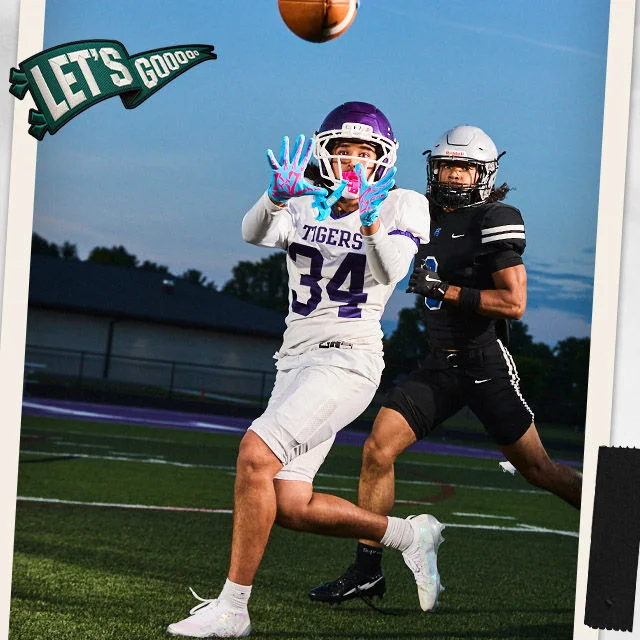 Football player catching a ball during a game.