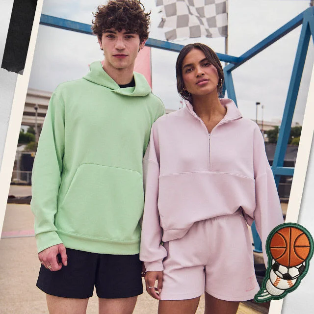 Boy and girl in new clothing sets.