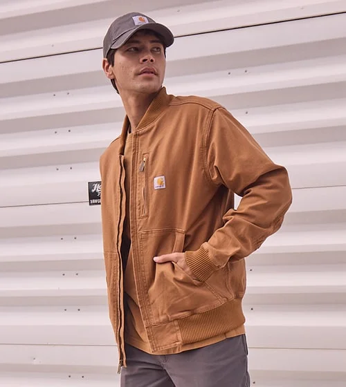 Man in tan jacket.