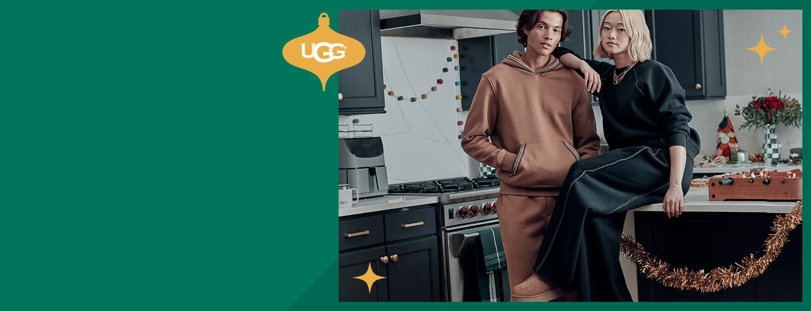 Man and woman sitting in a kitchen wearing Uggs. 