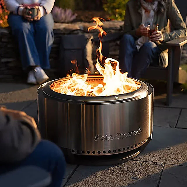 People sitting around a fire pit.