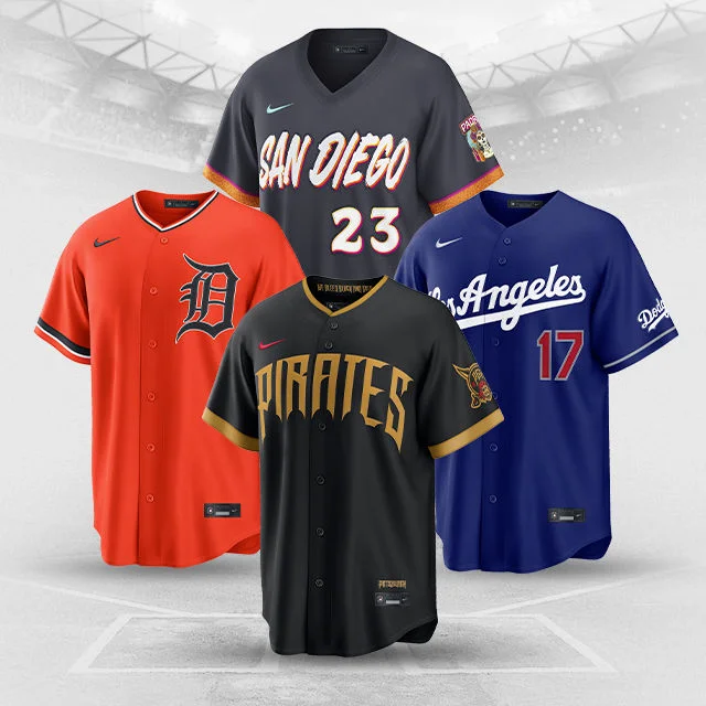Baseball jerseys on baseball field background.
