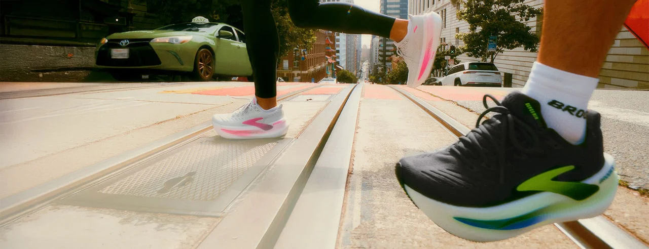 People running in Brooks running shoes. 