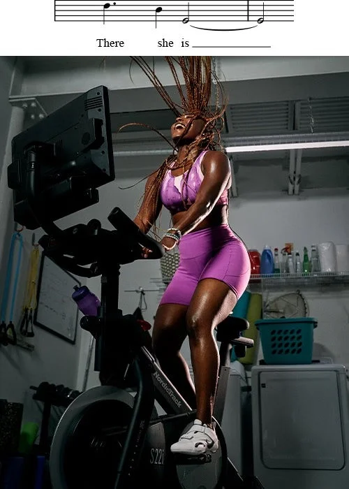Woman on exercise bike. 