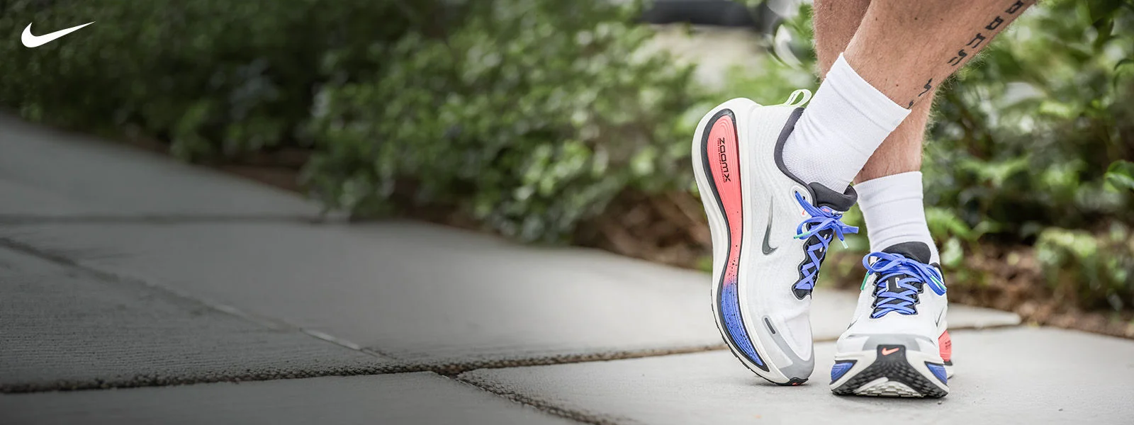 Nike athlete running outdoors.