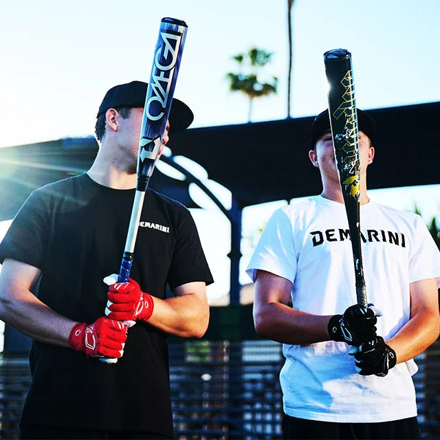 Athletes holding baseball bats.