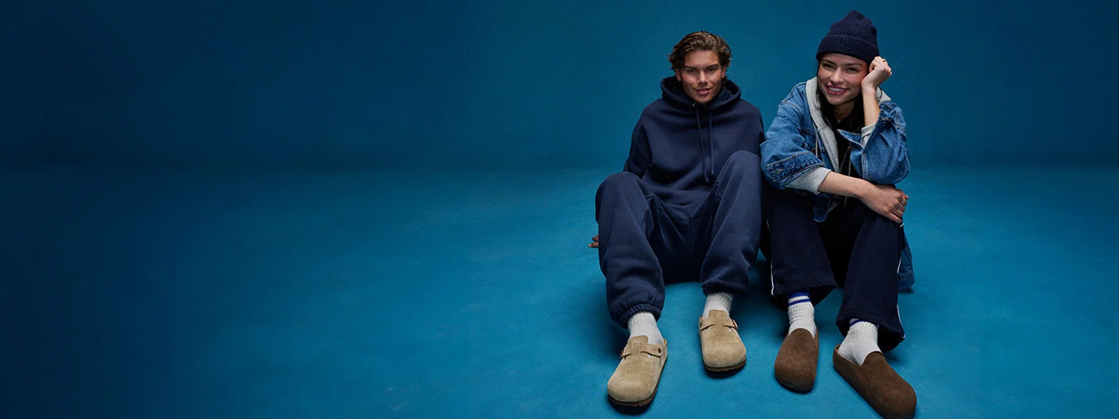 People wearing Birkenstock shoes. 