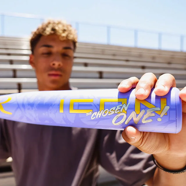 Athlete holding Rawlings Icon Chosen One bat