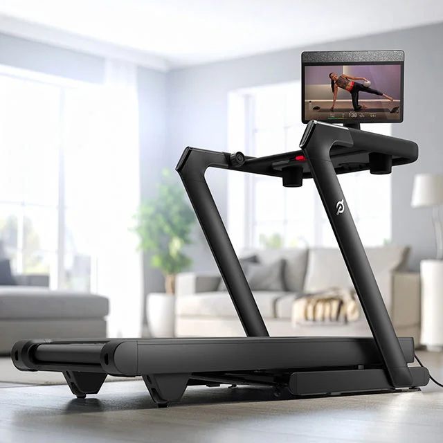 Peloton treadmill in living room.