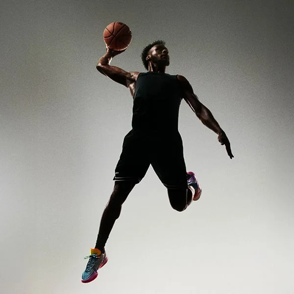 Basketball player in flight.