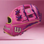 Pink Wilson baseball glove with bold accents.