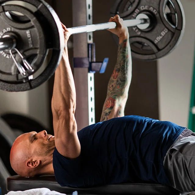 One Day Deals. Athlete lifting weights.