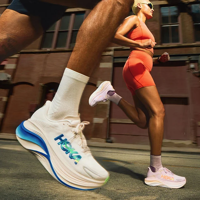 Athletes running outdoors.