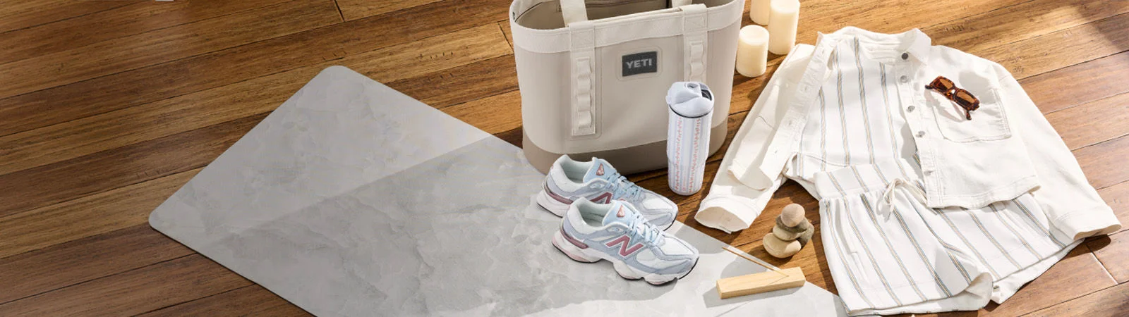 Mother's day apparel, shoes and accessoires on wood floor.