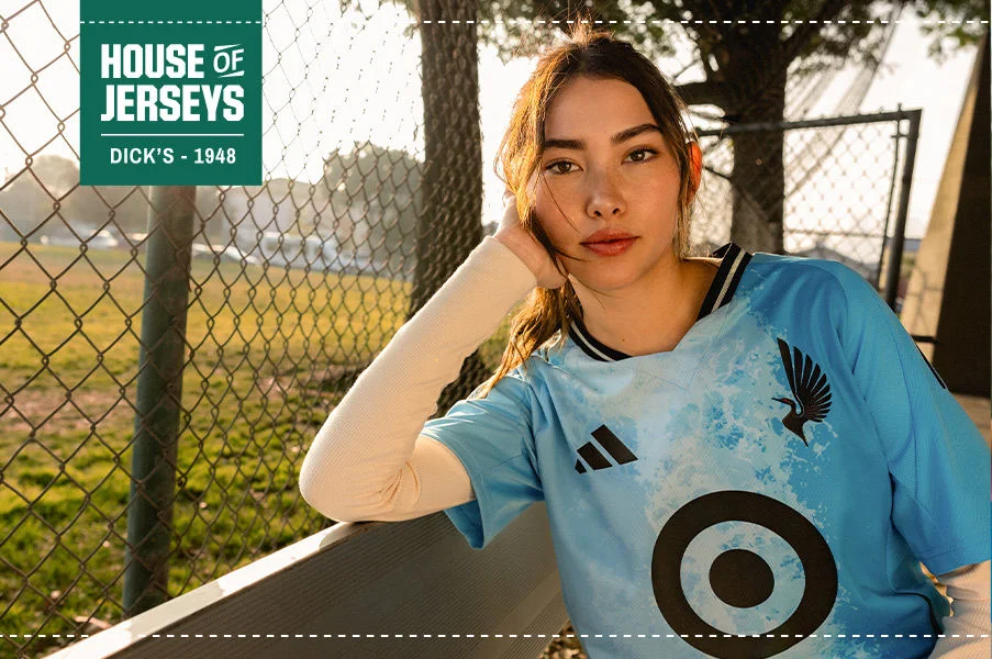 Female athlete wearing an MLS jersey.