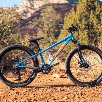 Pro BMX rider, Matty Cranmer, performing a trick in the skatepark on his freestyle BMX bike from Mongoose.