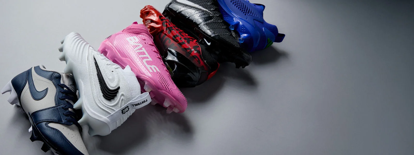 cleats layed down on backdrop