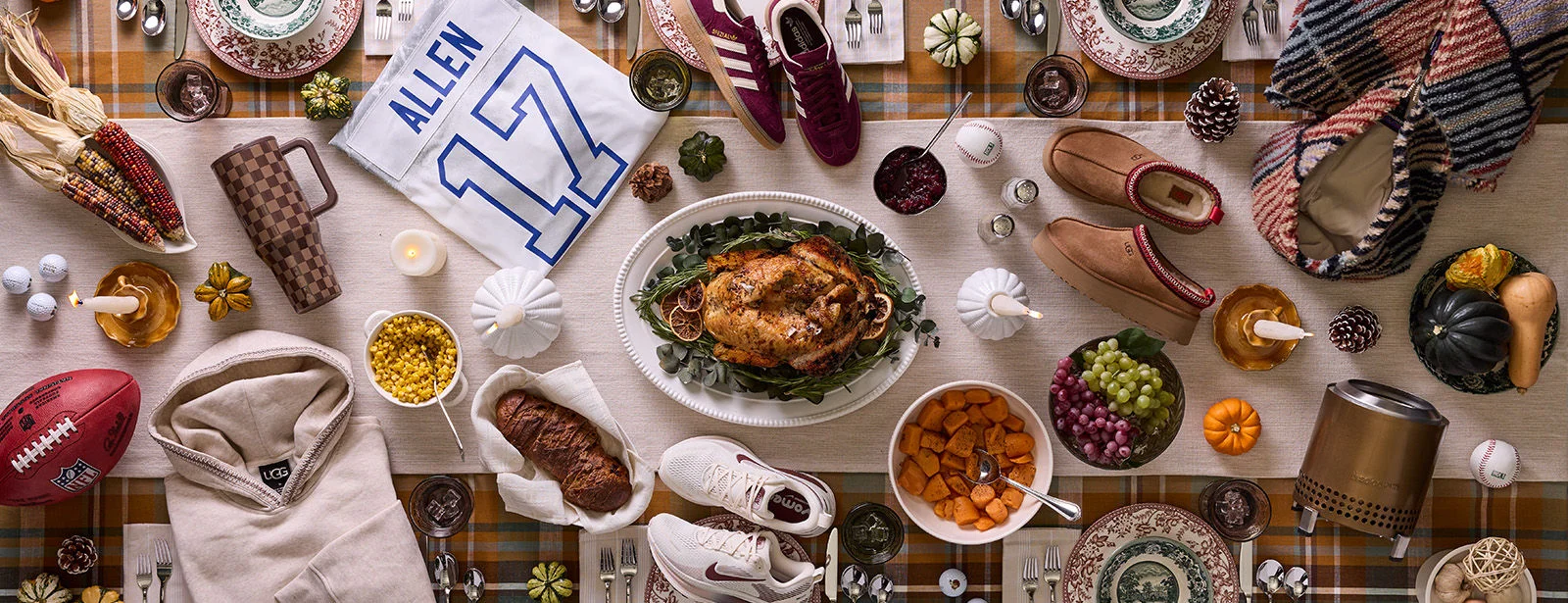 Thanksgiving dinner table with food and product. 