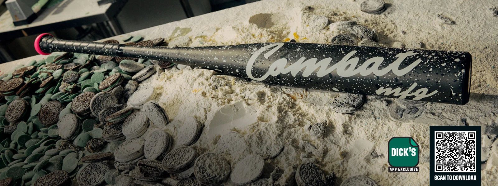 Baseball bats on dirt.