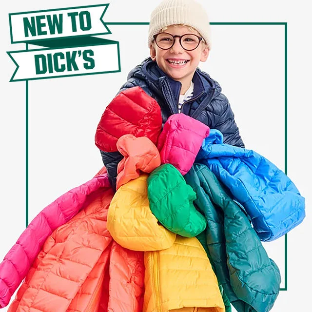 New to Dick's! Young boy carrying Primary outerwear jackets. 