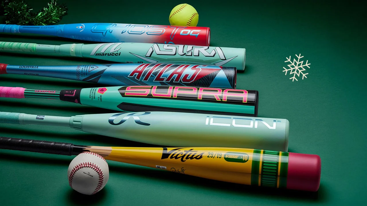 Baseball bats on green background.