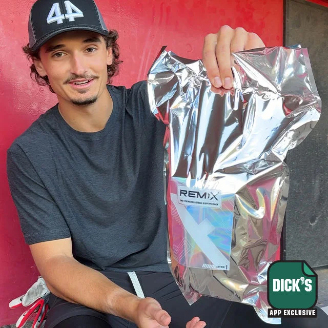 Athlete holding mystery packaging.