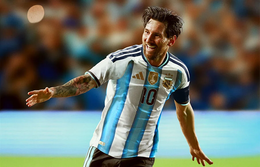 Messi wearing a jersey. 