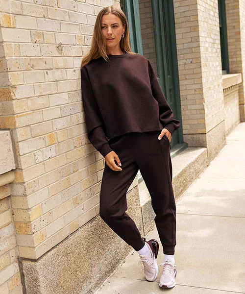 Woman in Nike 24.7 fleece.