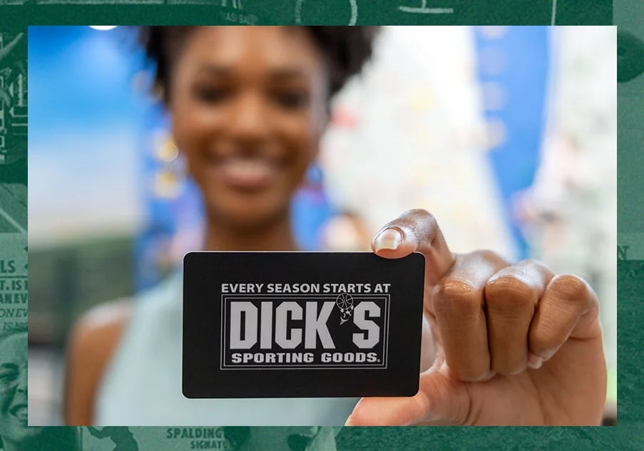 Woman holding a gift card