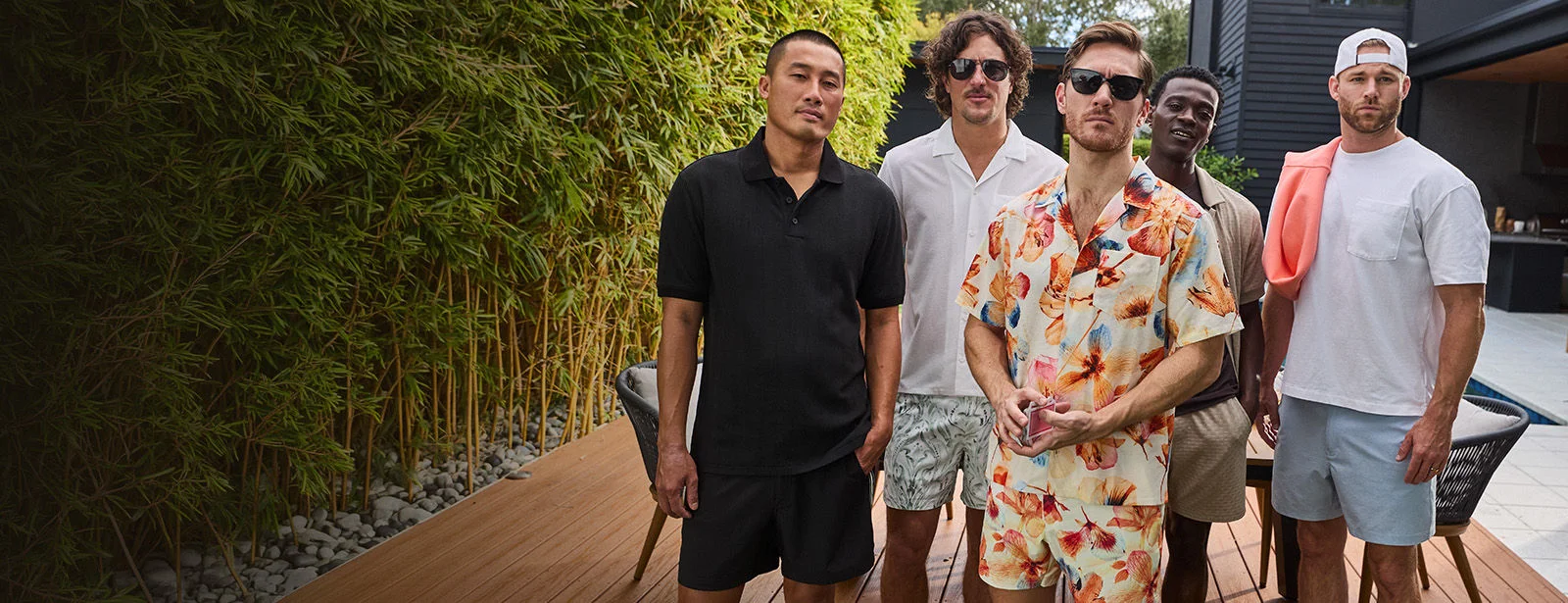 A group of men wearing VRST apparel