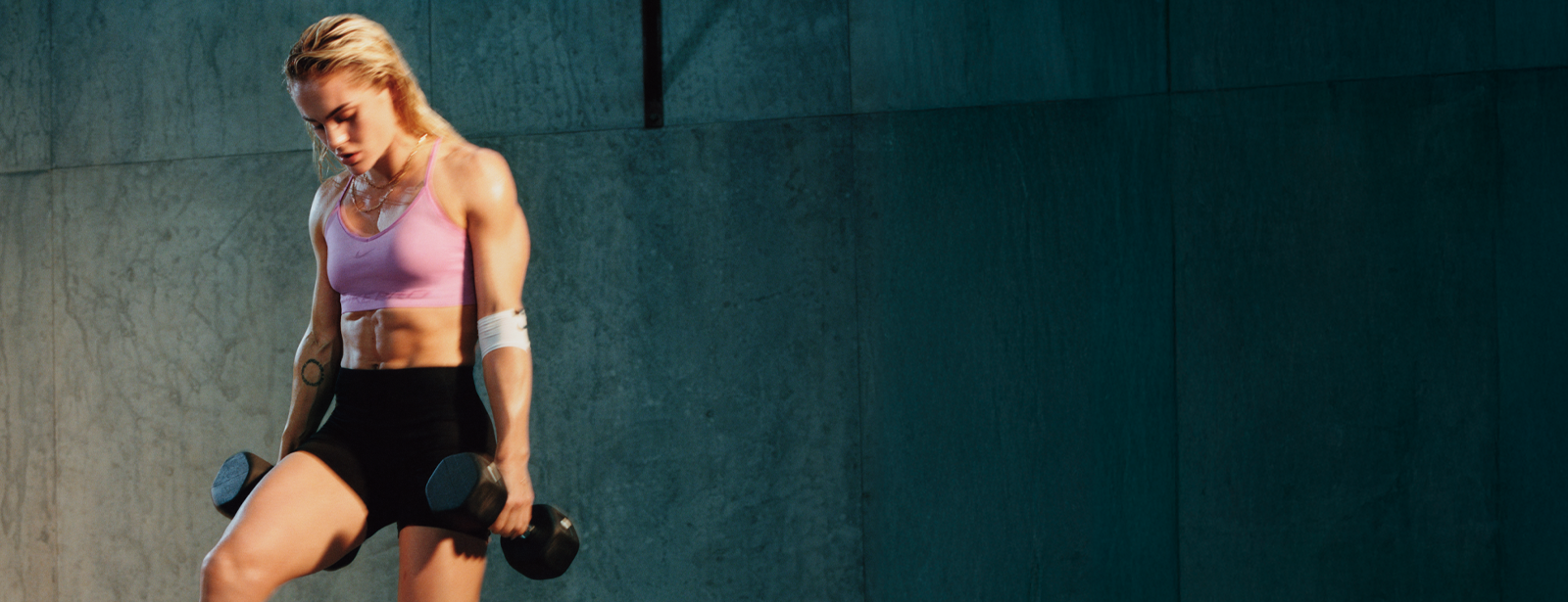 Couple in Nike 24.7 clothing collection.