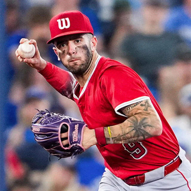 Baseball player throwing ball.