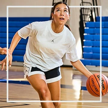 Image of Athlete Playing Basketball