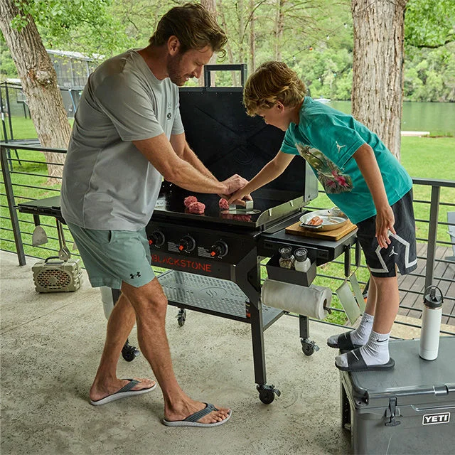 Father and son grilling.